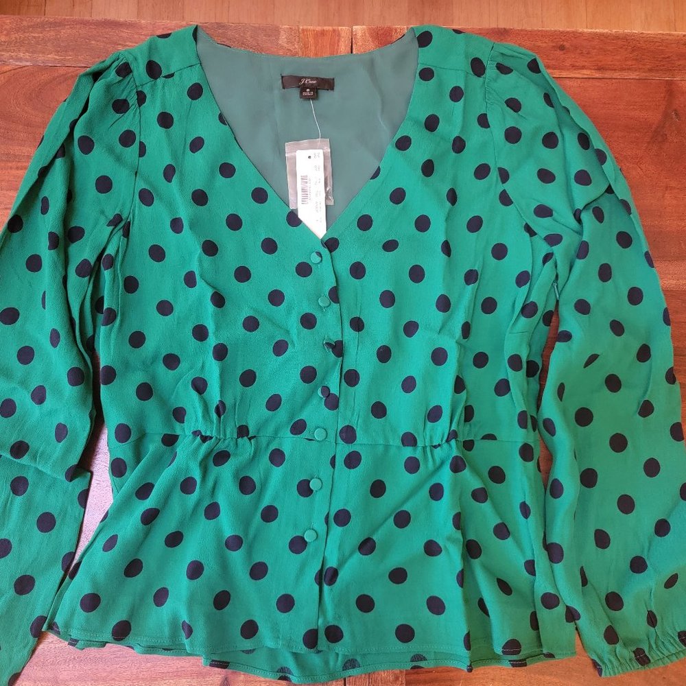 Long-sleeve peplum top in crepe polka dot